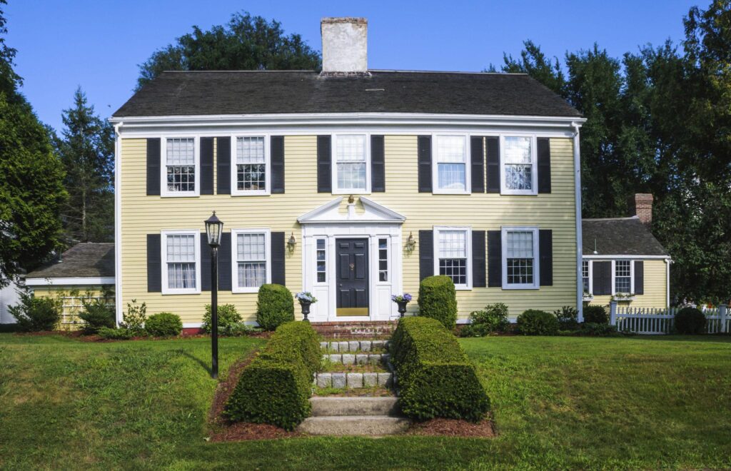 Two story colonial home exterior freshly painted in Delaware neighborhood